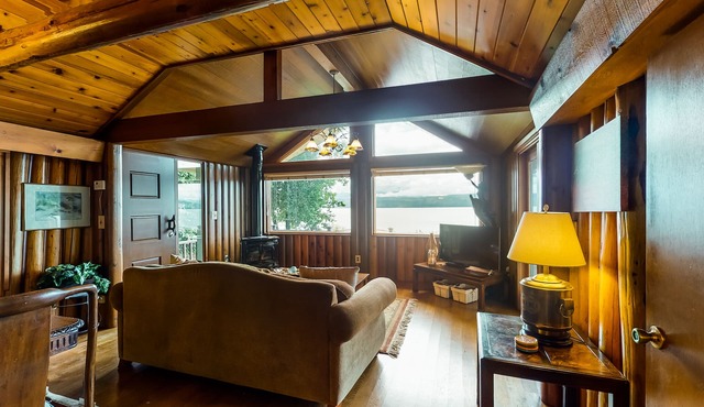 Charming waterfront home with full kitchen, furnished deck, & incredible views