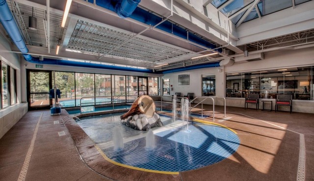 Cozy And Luxe Ski In/ski Out Condo In Breckenridge 2 Bedroom Condo by RedAwning