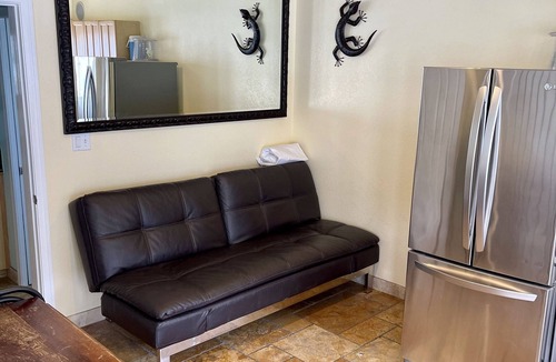 Avalon Villa | Fun Vibe in town over 600 5 STAR reviews two balcony’s SUP KAYAKS CHAIRS CLEAN