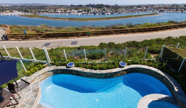 Gated View Home With All Tile Salt Water Pool