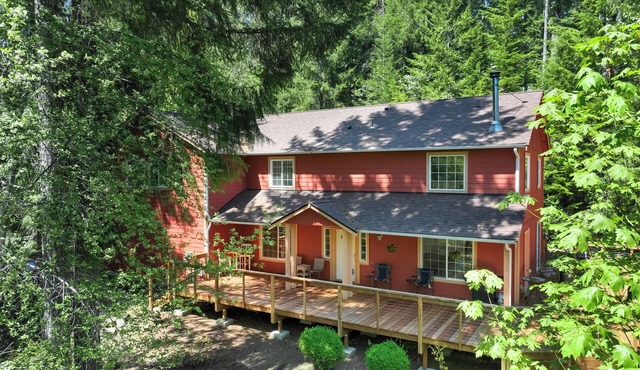 Huge deck with large hot tub and views!