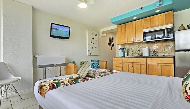 Ocean View Queen Studio with Balcony at the Waikiki Grand Hotel® 309