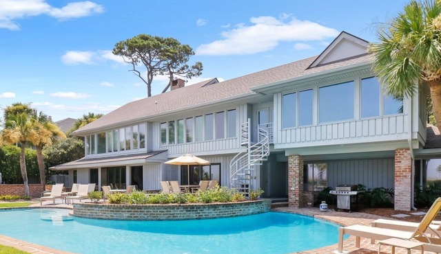 Oceanfront home with huge windows and a panoramic views
