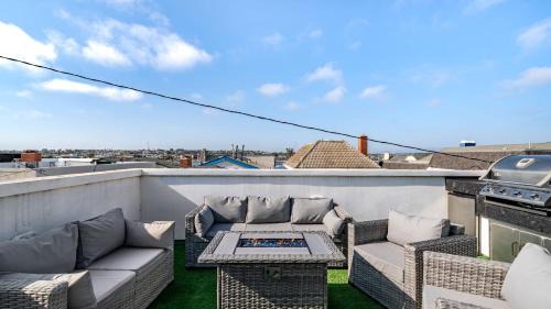 Private Rooftop Steps to the Beach Chic Design Seaside Style by AvantStay