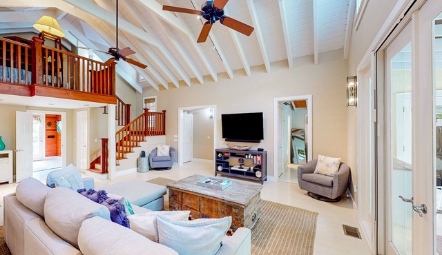 Snowbird-friendly oasis with private heated pool, lush yard, & ample parking