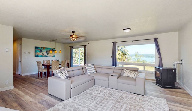 Soundfront home with WiFi, washer/dryer, central AC, and enclosed yard