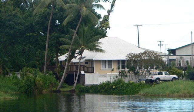 Waterfront in heart of Hilo, 1 block to hotels. Built on pond w/fish & turtles.